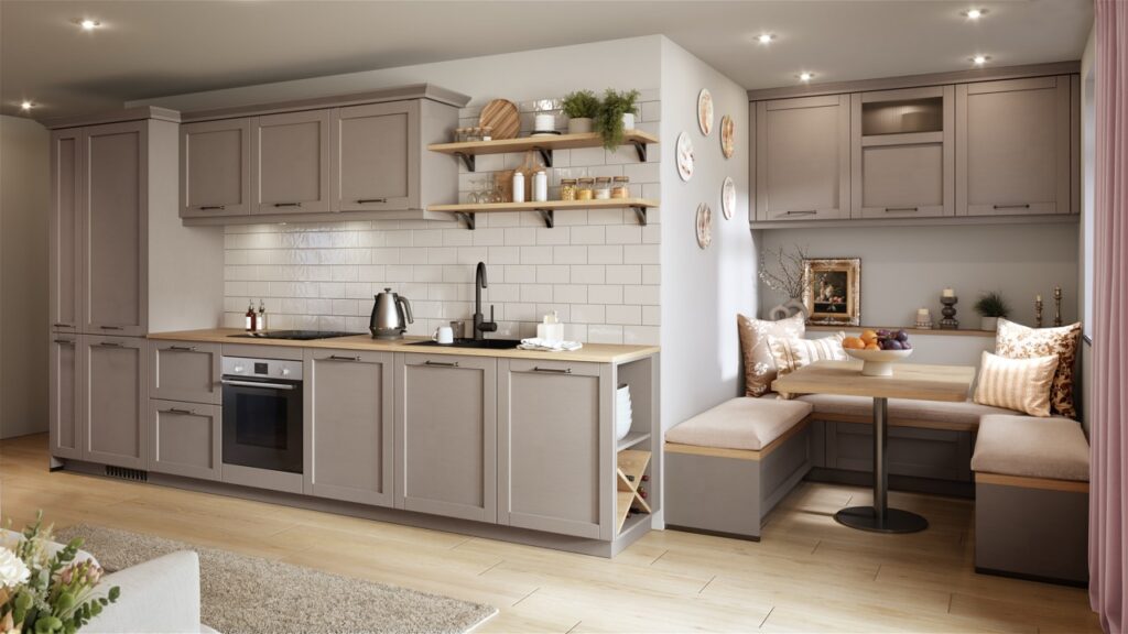Cuisine équipée taupe avec plan de travail en bois clair, crédence en carreaux blancs, étagères murales et coin repas avec banquettes beiges et table.
